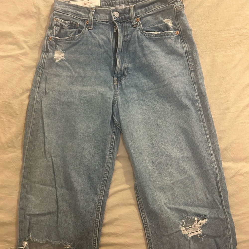Distressed Light Blue Jeans